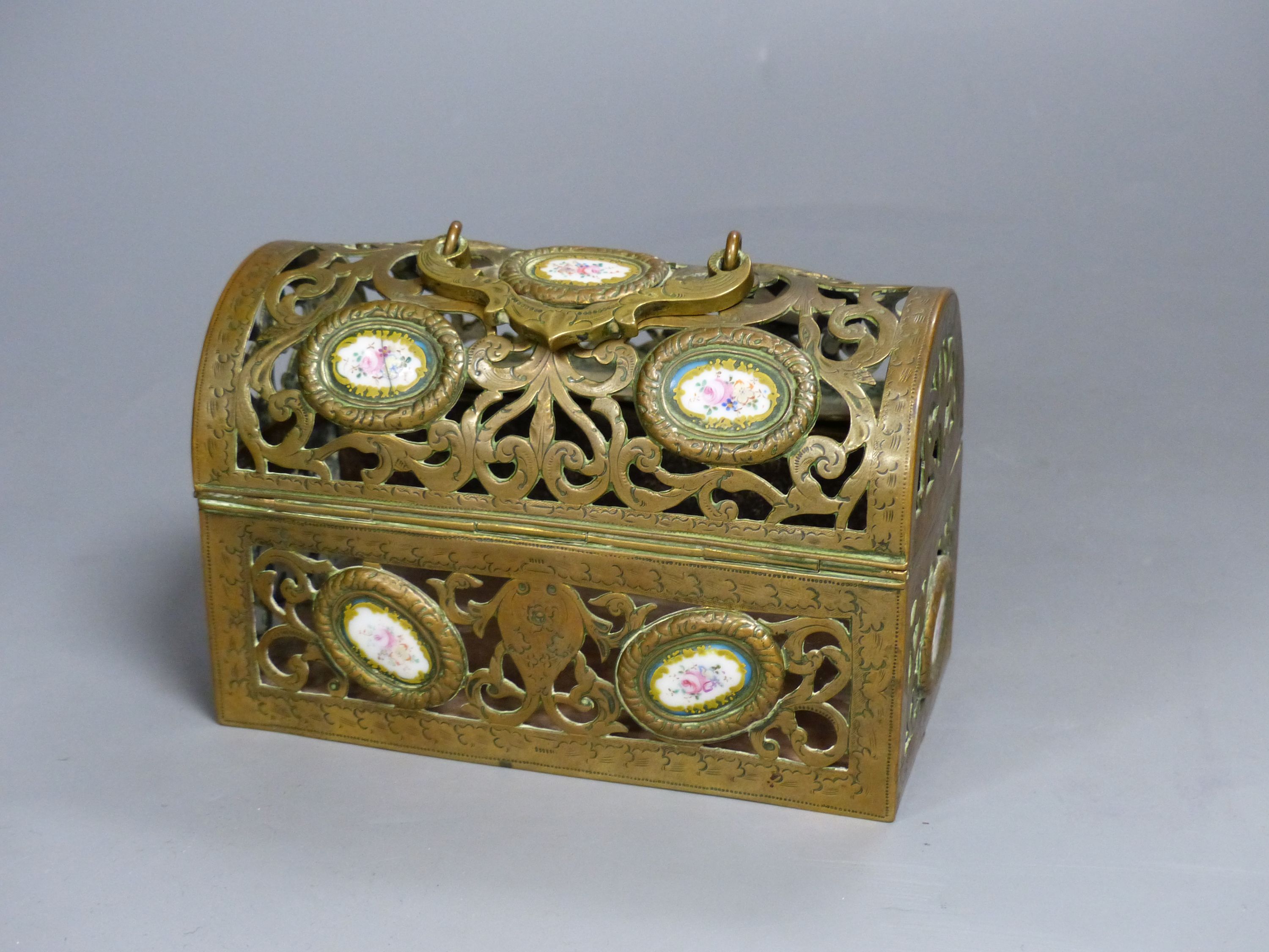 A 19th century French pierced and engraved bronze and enamel casket, 14cm